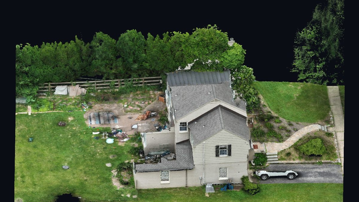 Navigable 3D site model of a house and lot built from drone photogrammetry